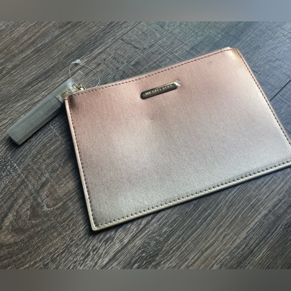 Michael Kors Handbags - Michael Kors ombré clutch with metal tassel NWT